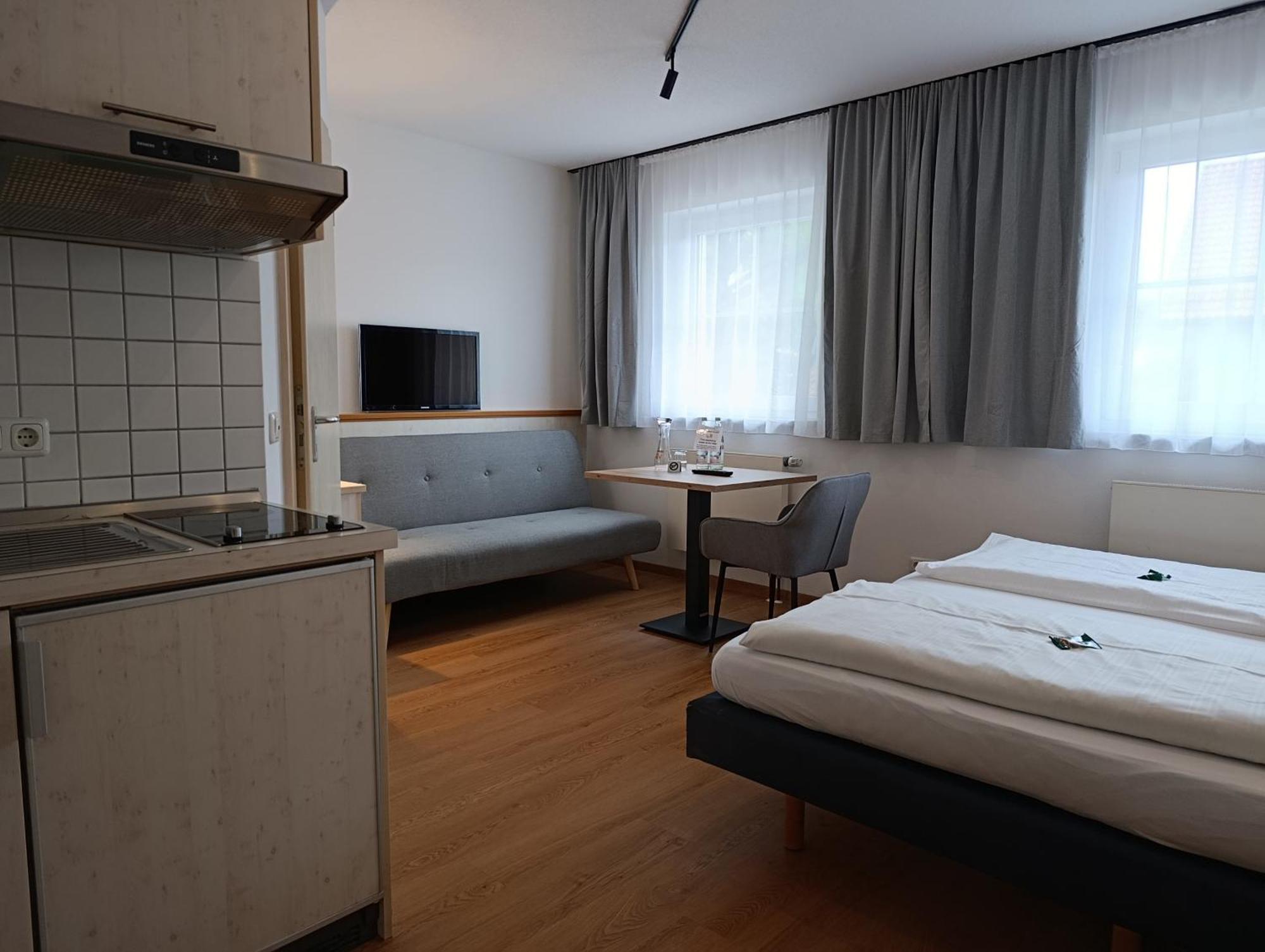 Mikro Apartments Эрдинг Экстерьер фото